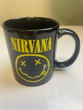 NIRVANA Black Mug with Yellow Smiley Logo